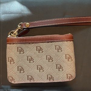 Dooney & Bourke wristlet not used. Brown & tan